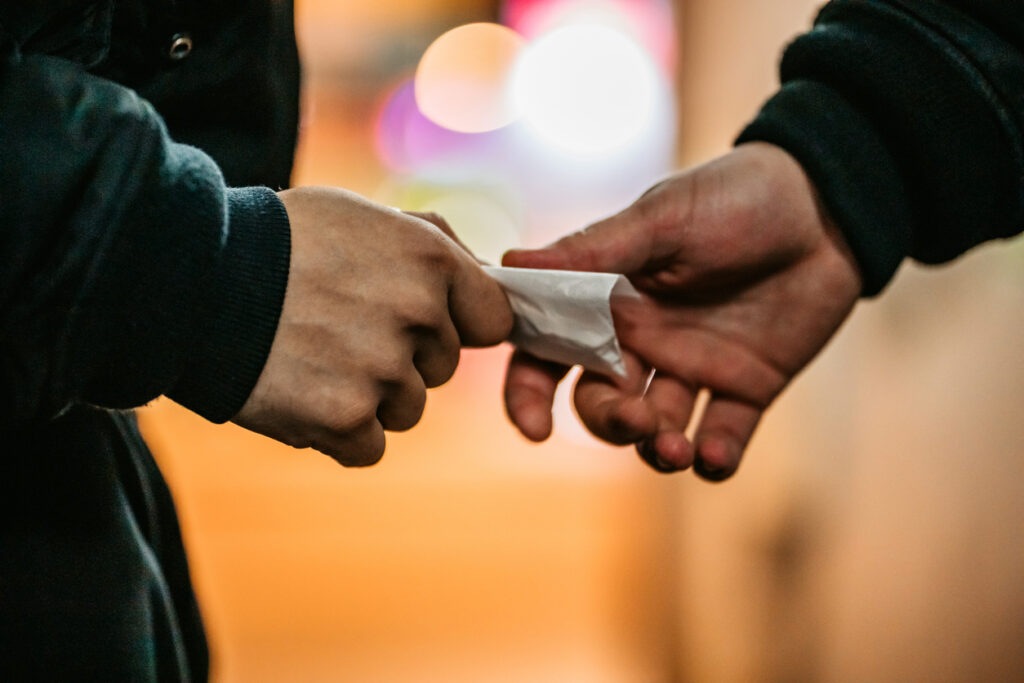 Man Buying Drugs On The Street